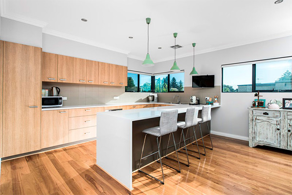 kitchen renovation using timber flooring and cabinets