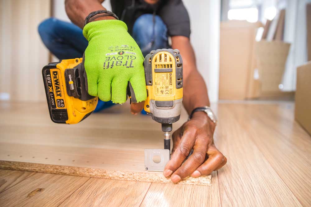 Tradie working with a drill